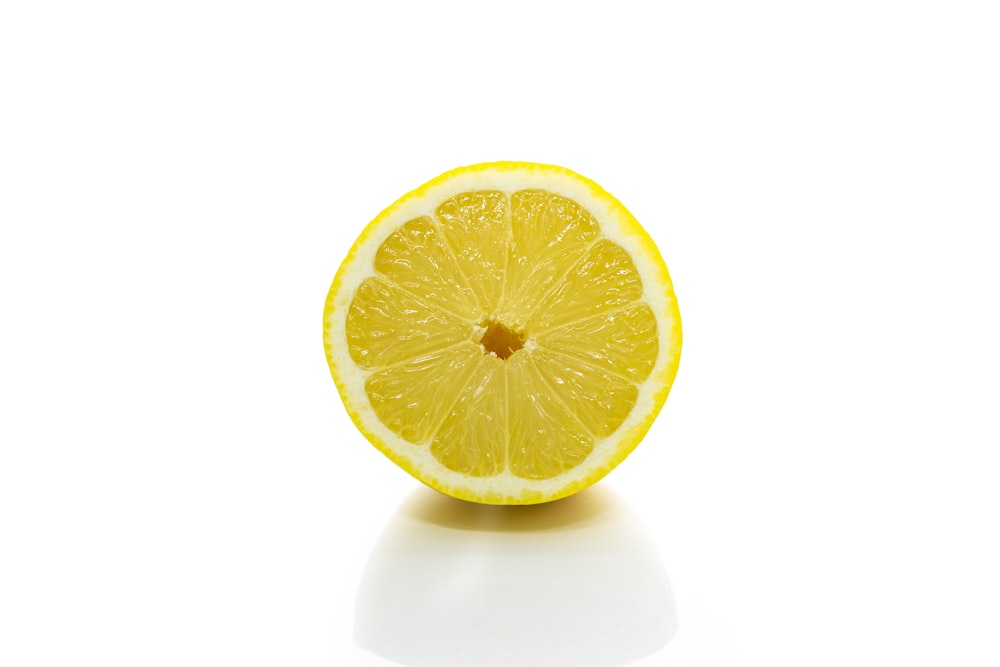 sliced lemon on white background