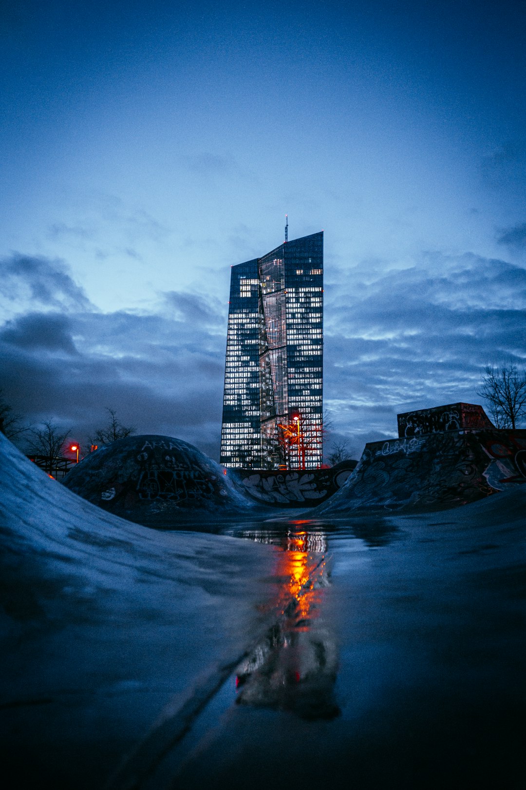 city skyline under gray cloudy sky during daytime