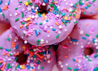 pink and white doughnut with sprinkles