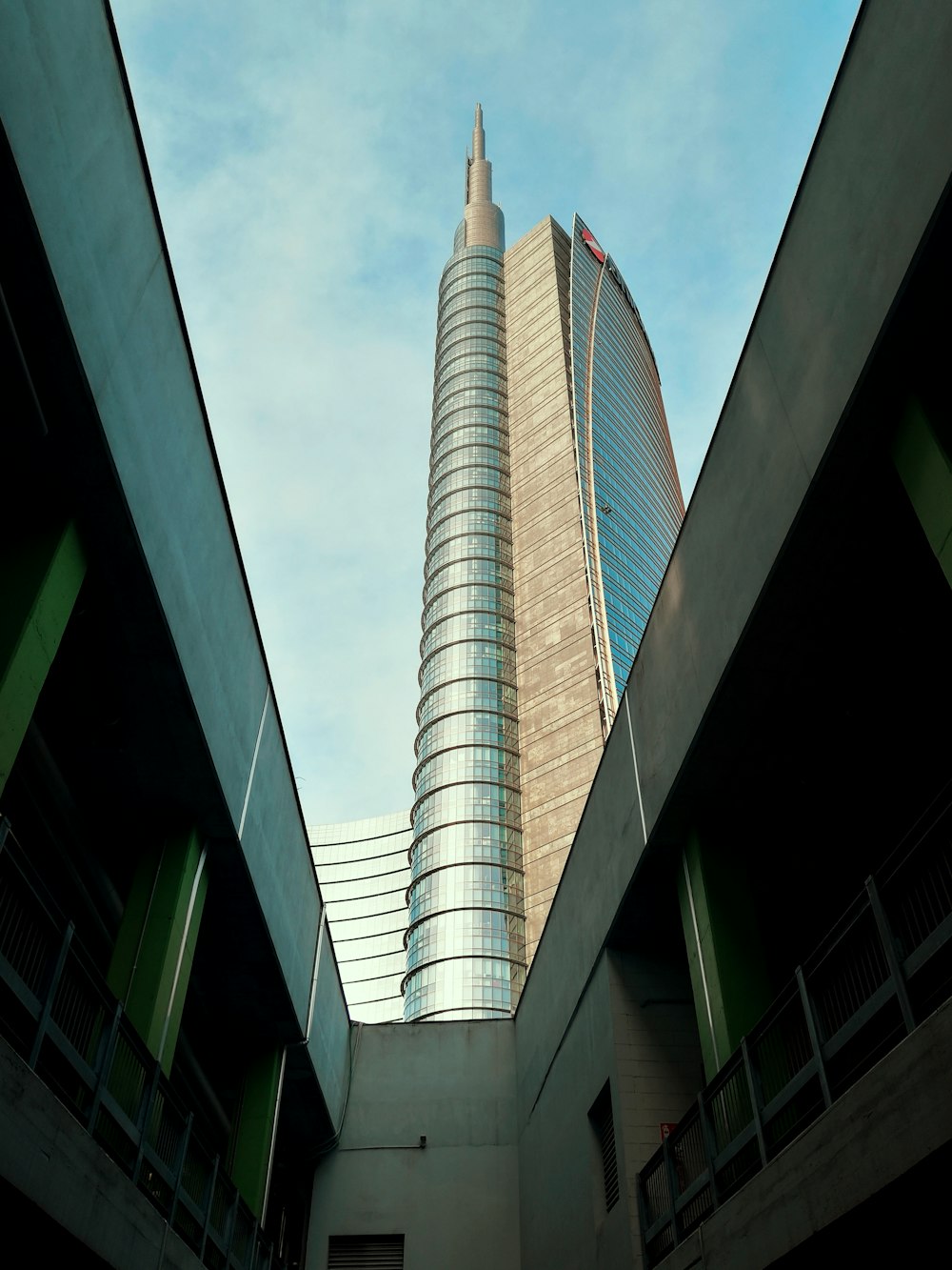 white and blue concrete building under blue sky during daytime