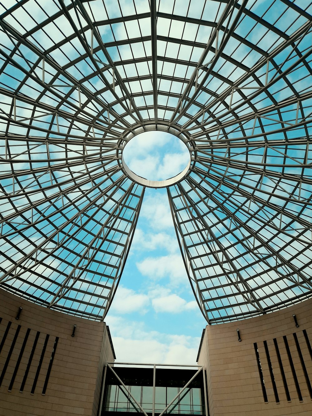 white and blue round building