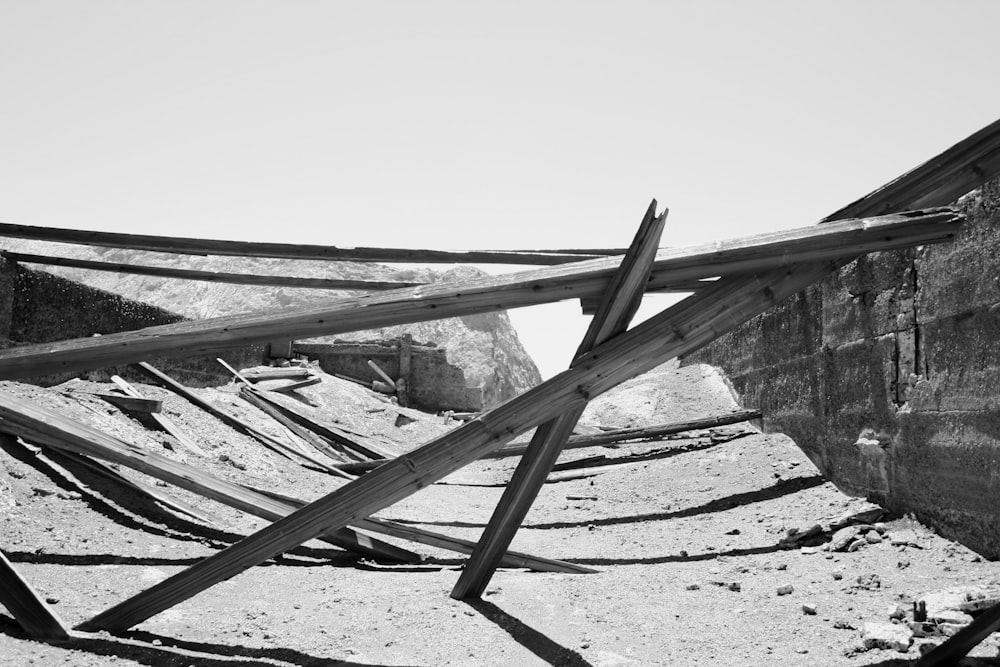 grayscale photo of wooden fence