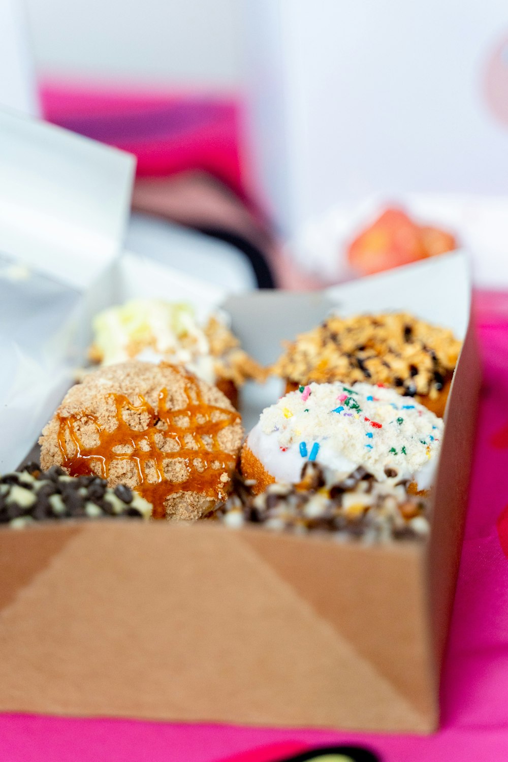 brown and white pastry in box