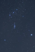 Star constellation of Aquarius shining brightly in the night sky.