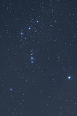 Night sky with the Orion constellation shining brightly, symbolizing guidance.
