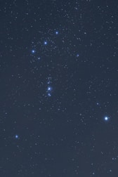 A close-up of a starry sky with constellations clearly visible.