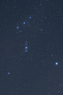 A close-up of a starry sky with constellations clearly visible.