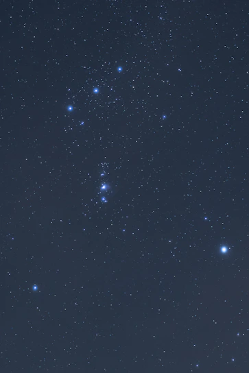 A glowing crab constellation shining brightly in a night sky.