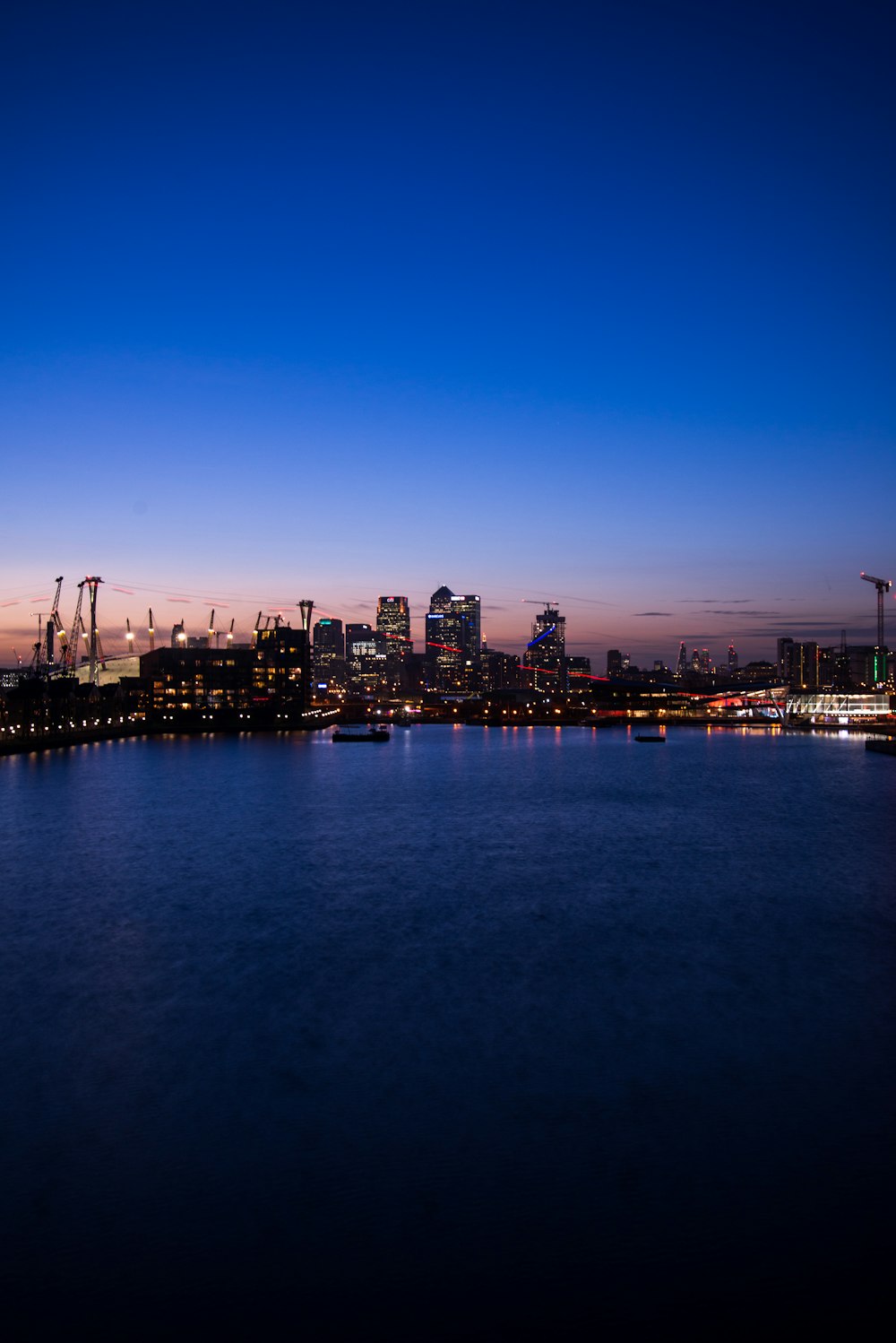 city skyline during night time