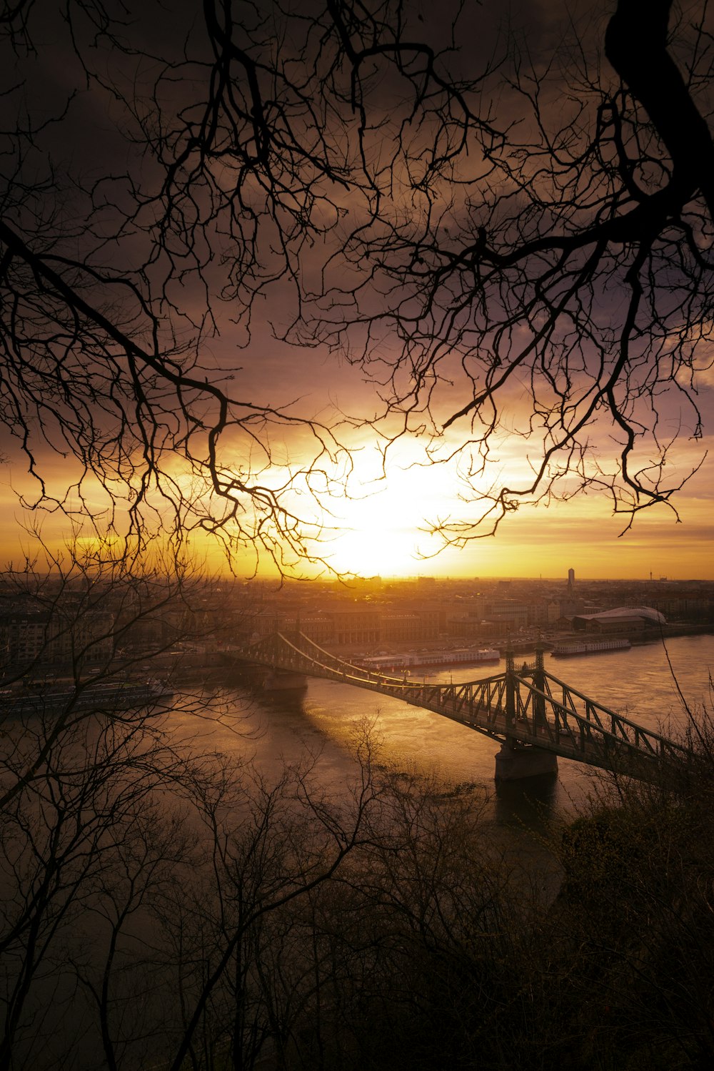 silhouette of bridge during sunset