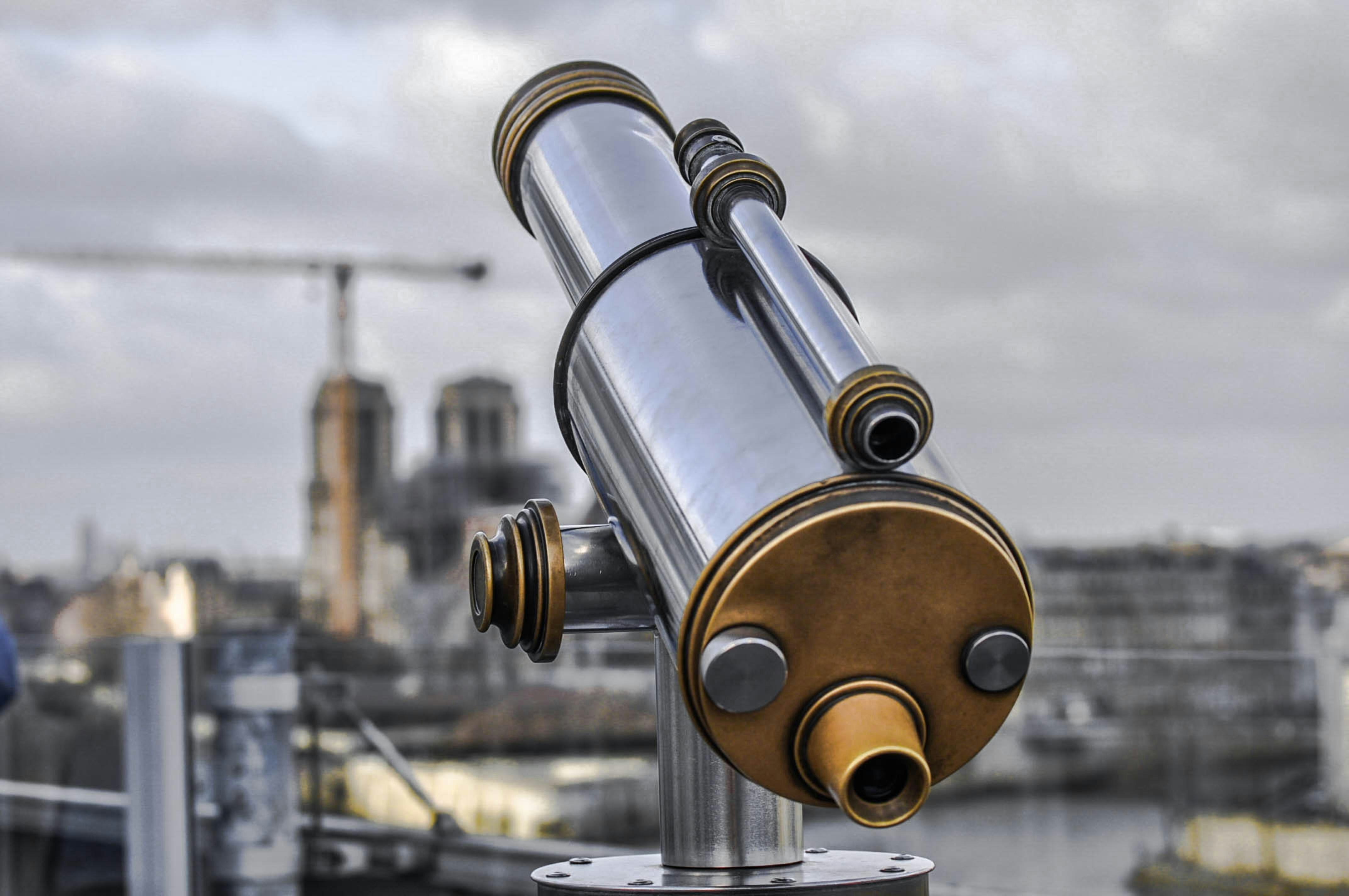 gold and silver telescope during daytime