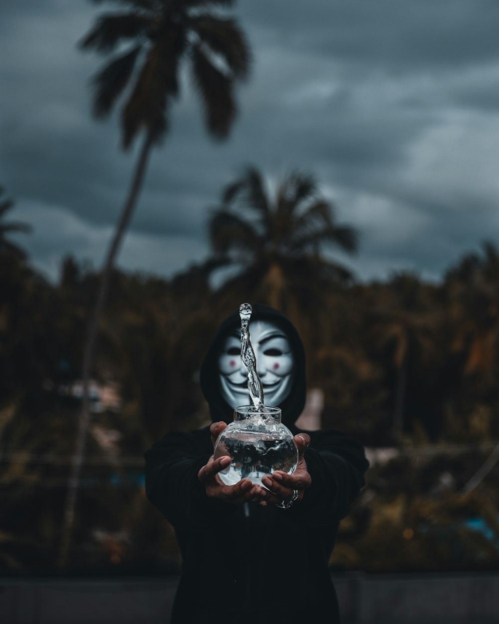 person wearing black and white mask
