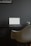 A modern office space with a sleek desk and laptop, symbolizing a virtual workspace.