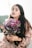 woman holding bouquet of flowers