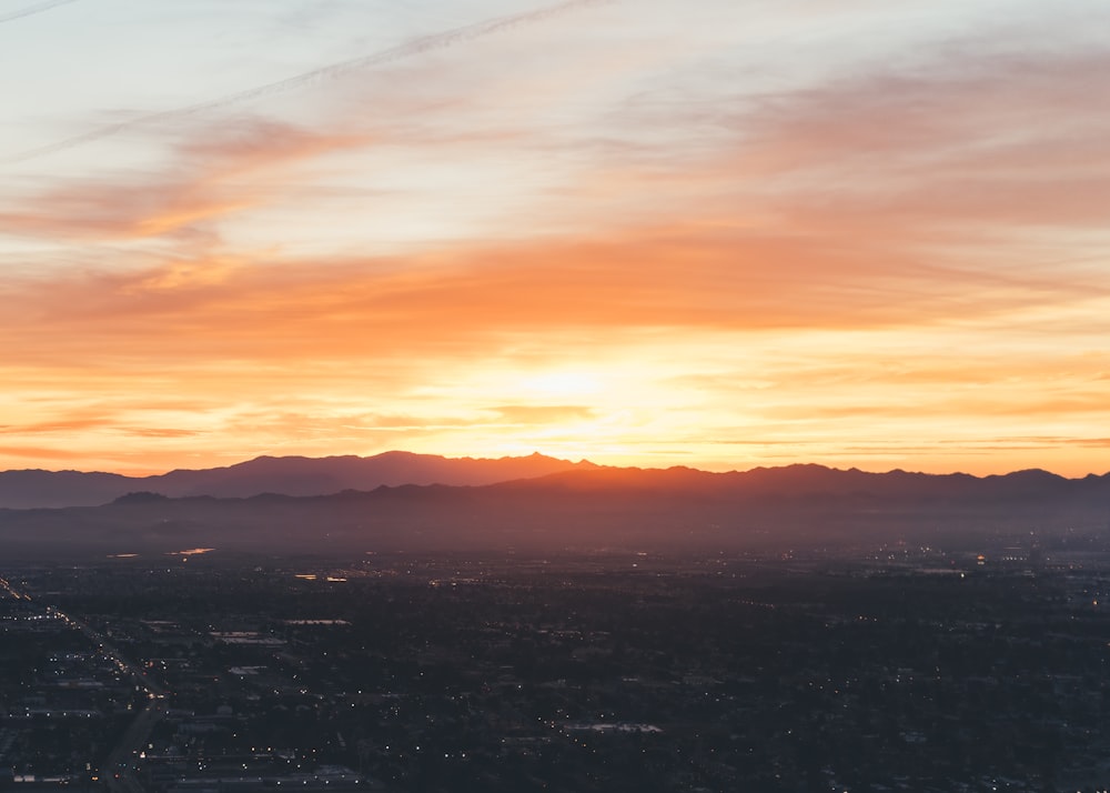 silhouette of mountain during sunset