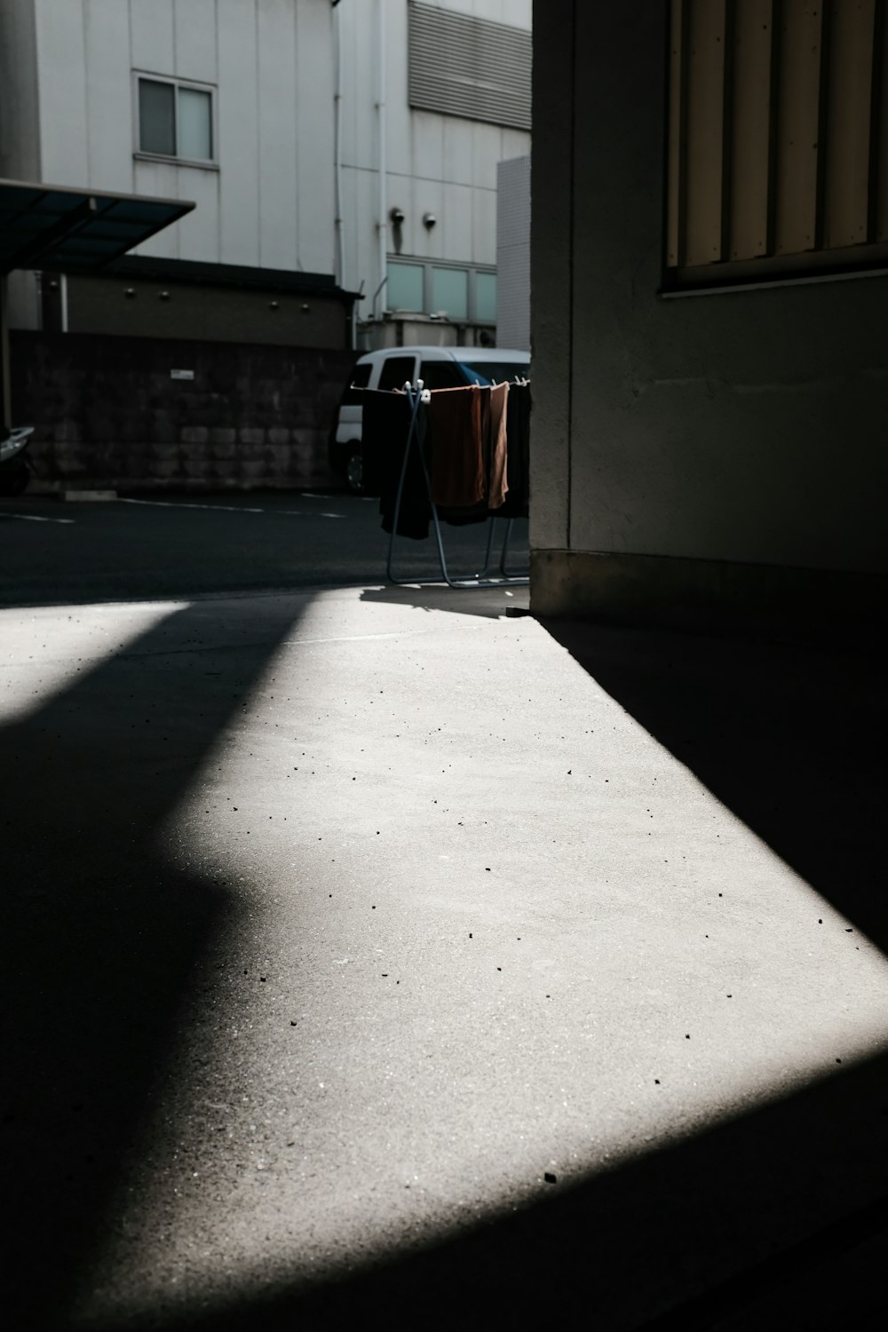 red and white cooler box on gray concrete floor