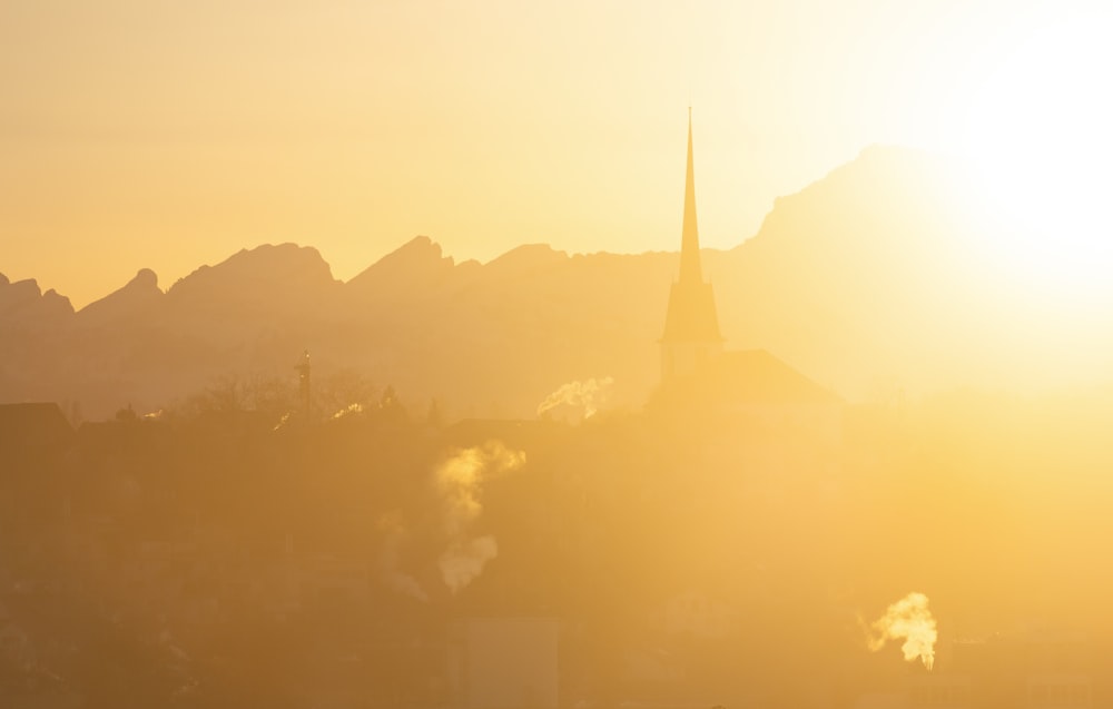 silhouette of building during sunset