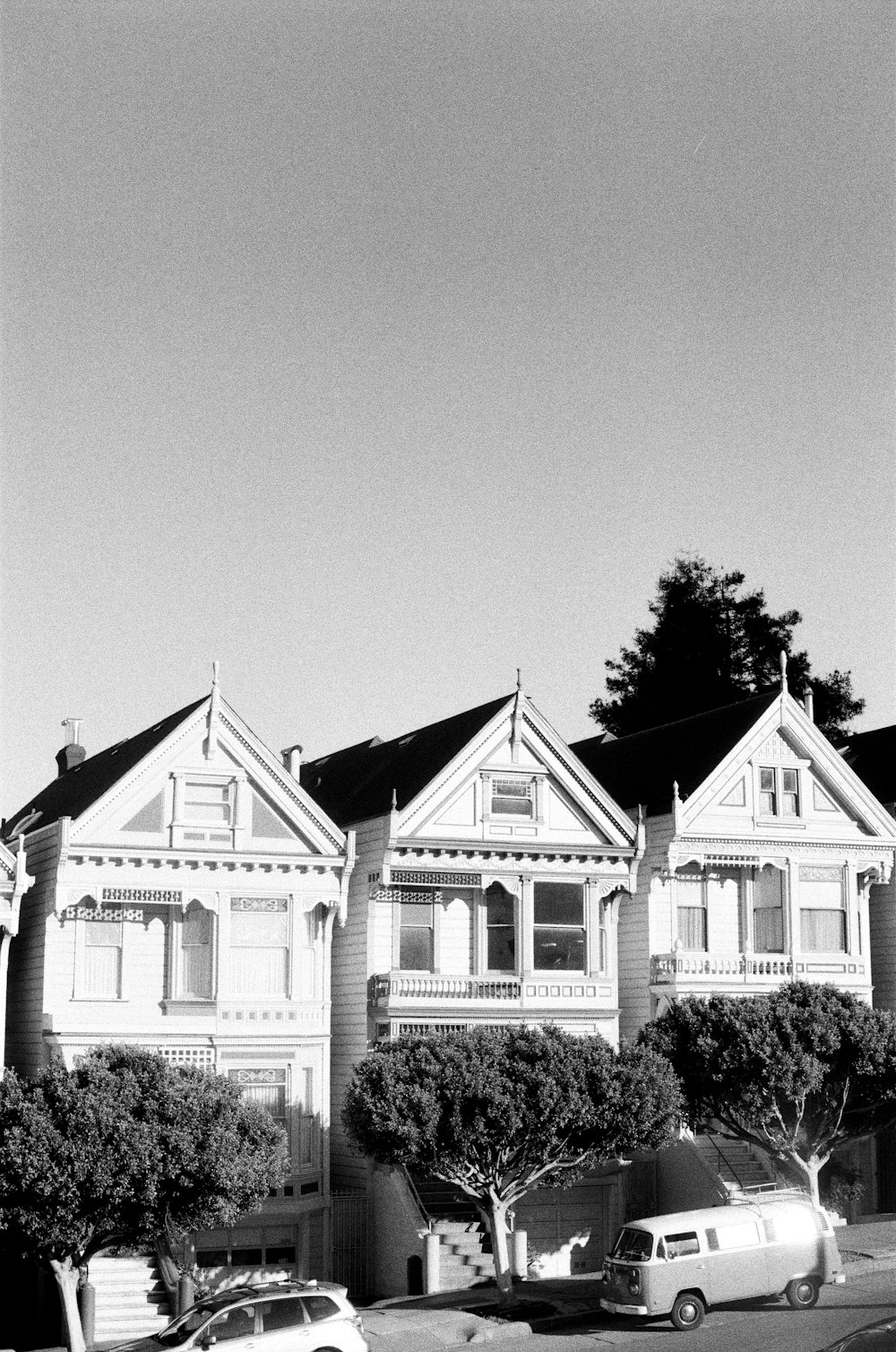 grayscale photo of 2 storey house