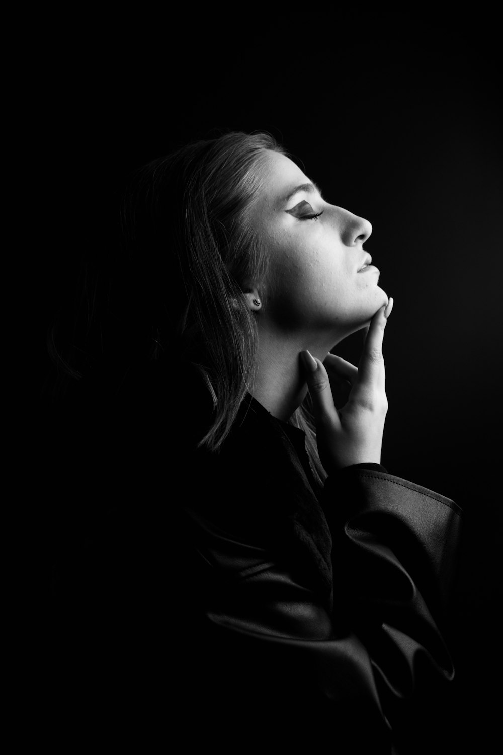 woman in black leather jacket