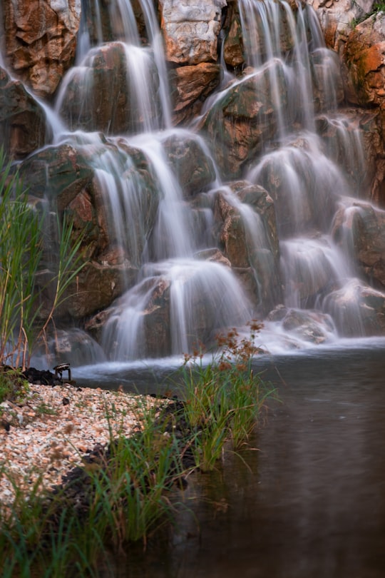 water falls on brown soil in Nanyang Technological University Singapore