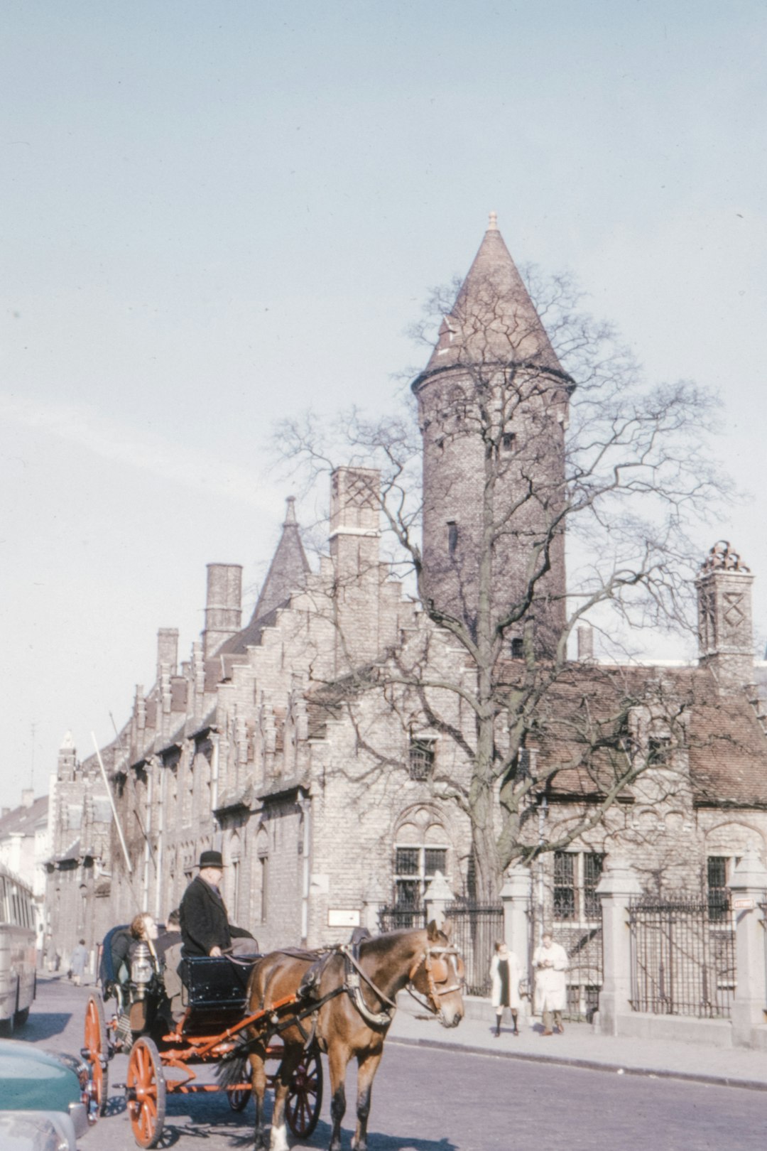 people walking on street near brown concrete building during daytime