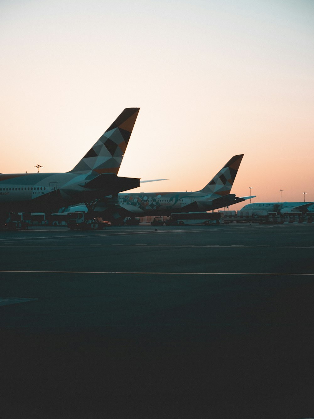 white passenger plane on airport during daytime