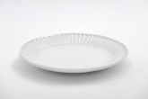 white round plate on white table
