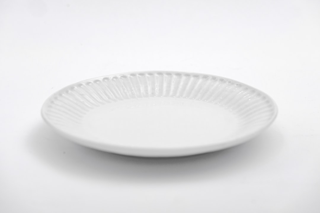  white round plate on white table dish