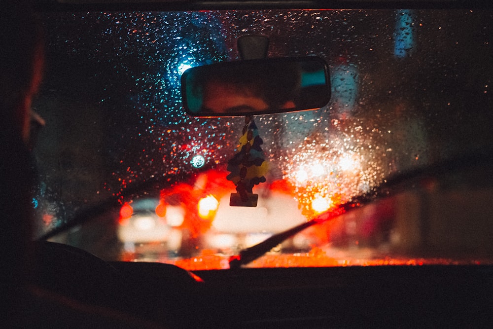 car window with water droplets