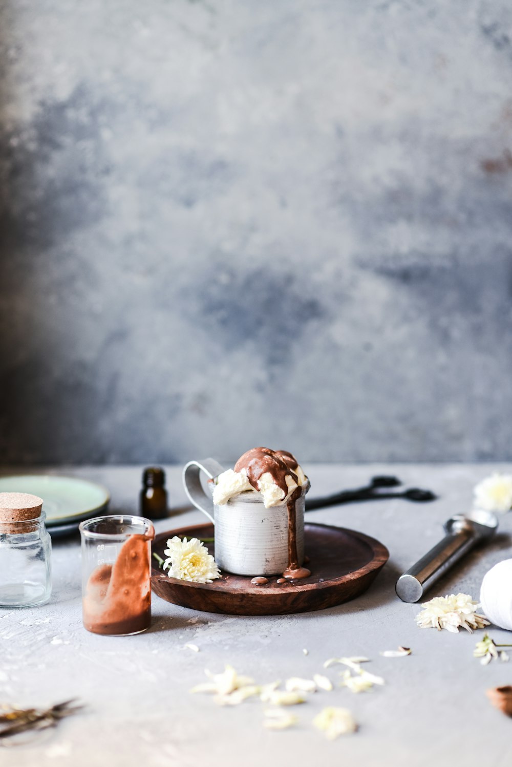 brown ceramic mug on brown wooden round tray