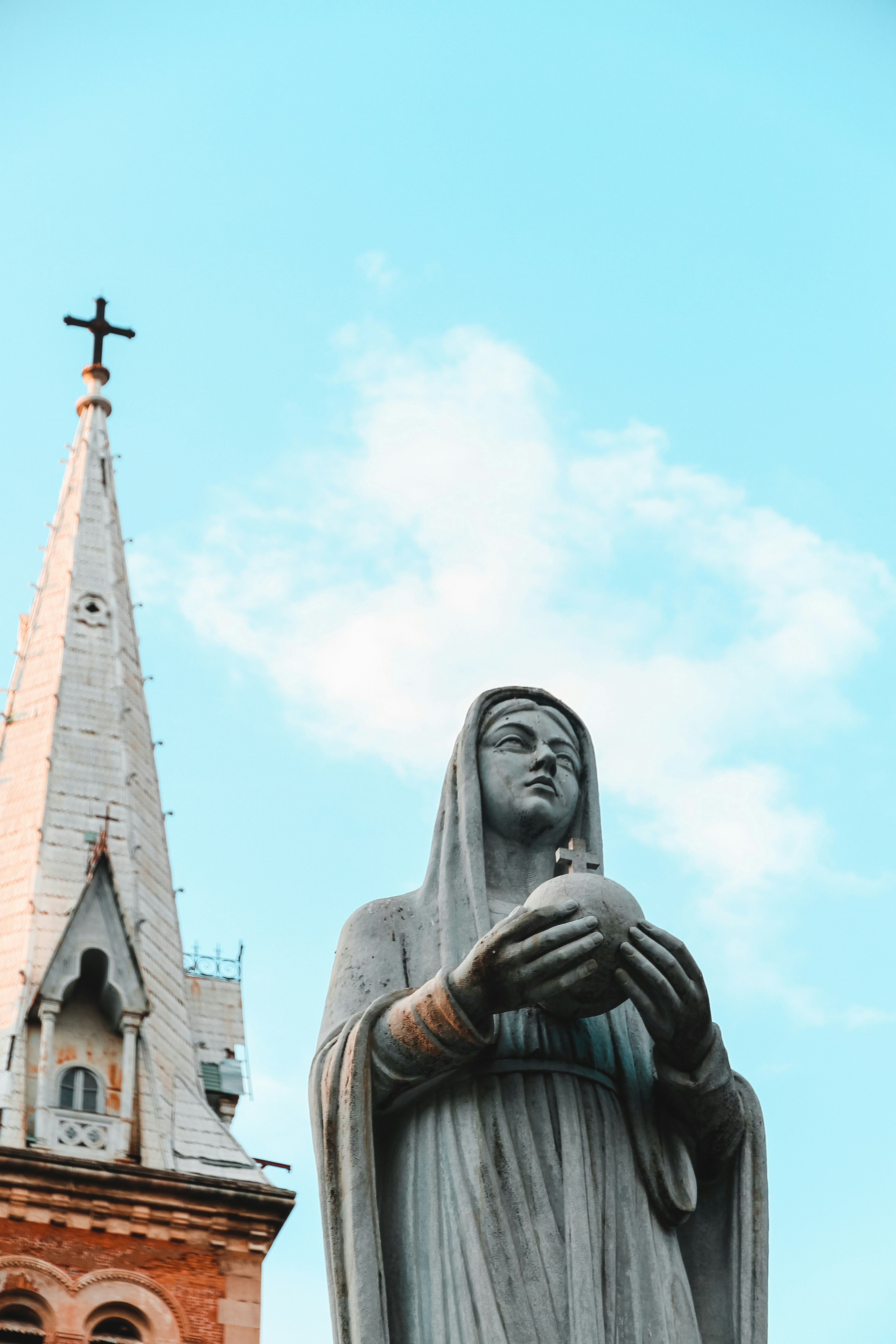 gray concrete statue of a woman