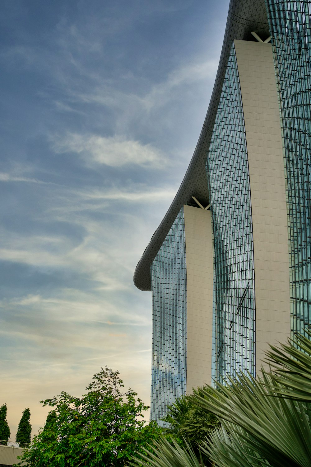 gray concrete building under gray clouds during daytime