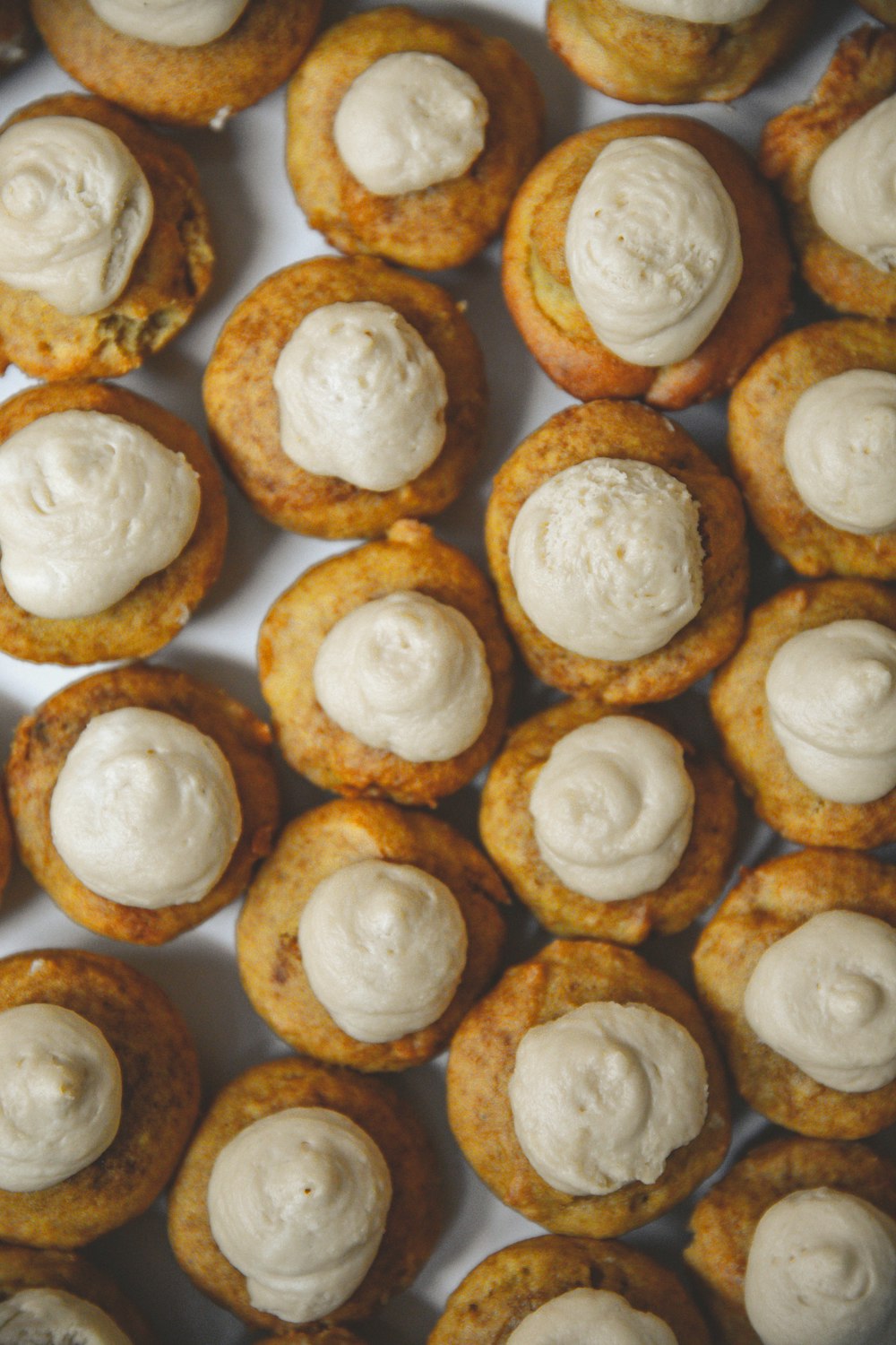 brown and white cookies on brown wooden table