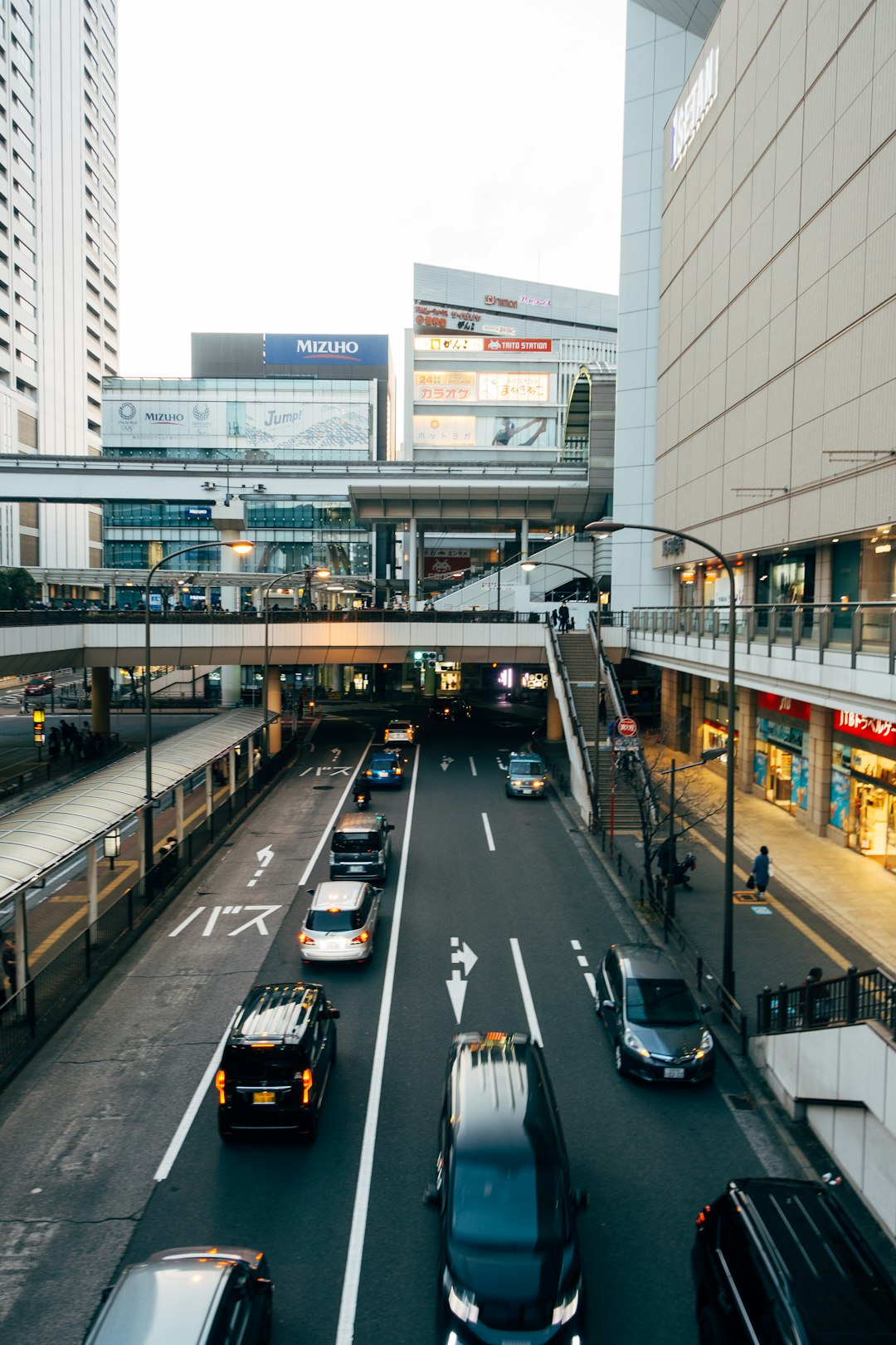 cars on road near buildings during daytime