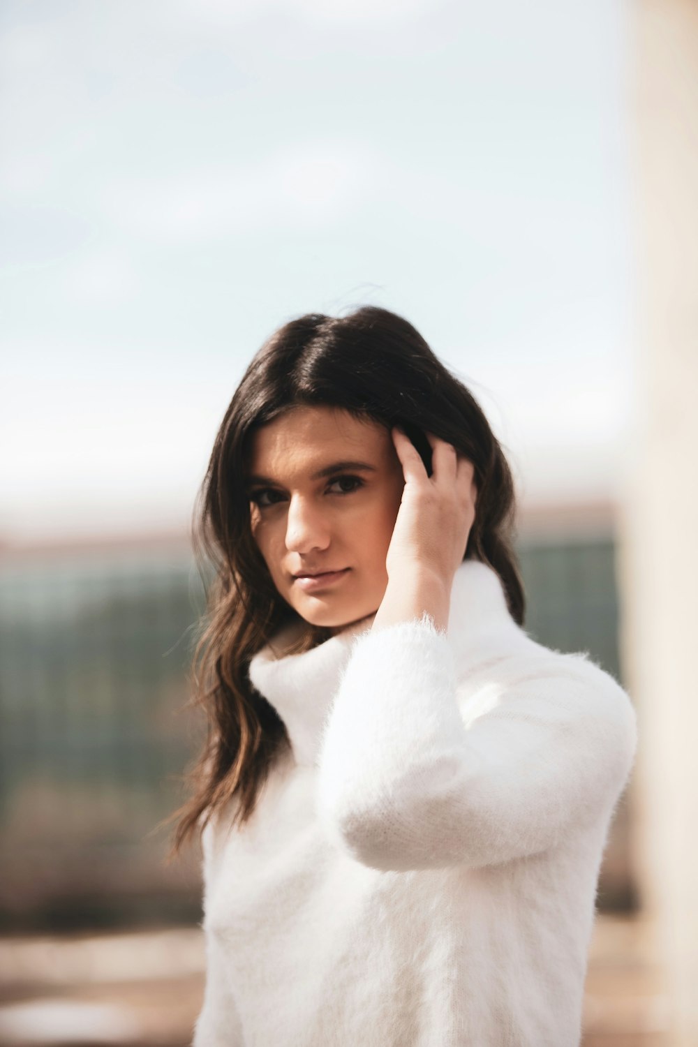 woman in white fur coat