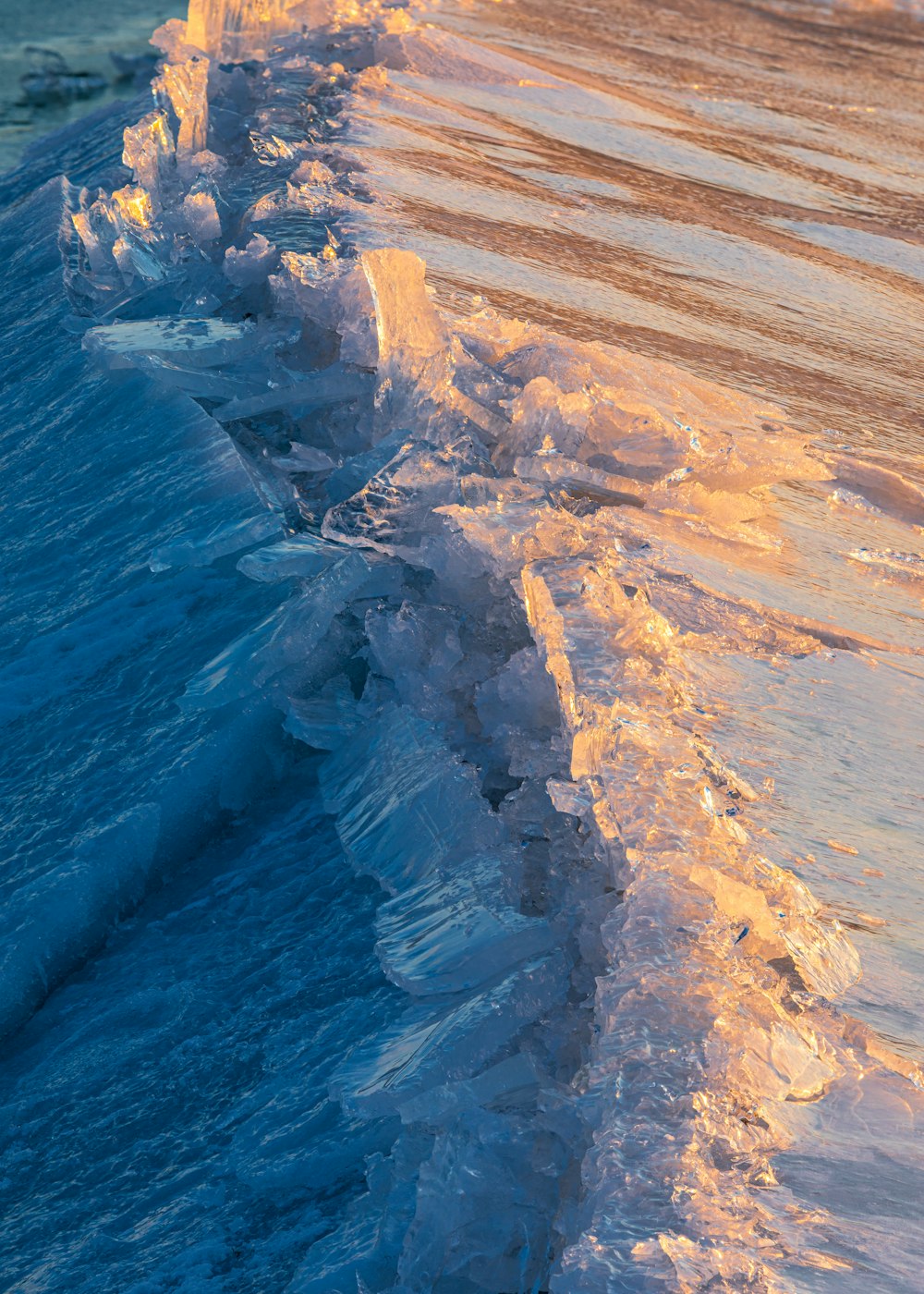 brown rock formation beside blue sea during daytime