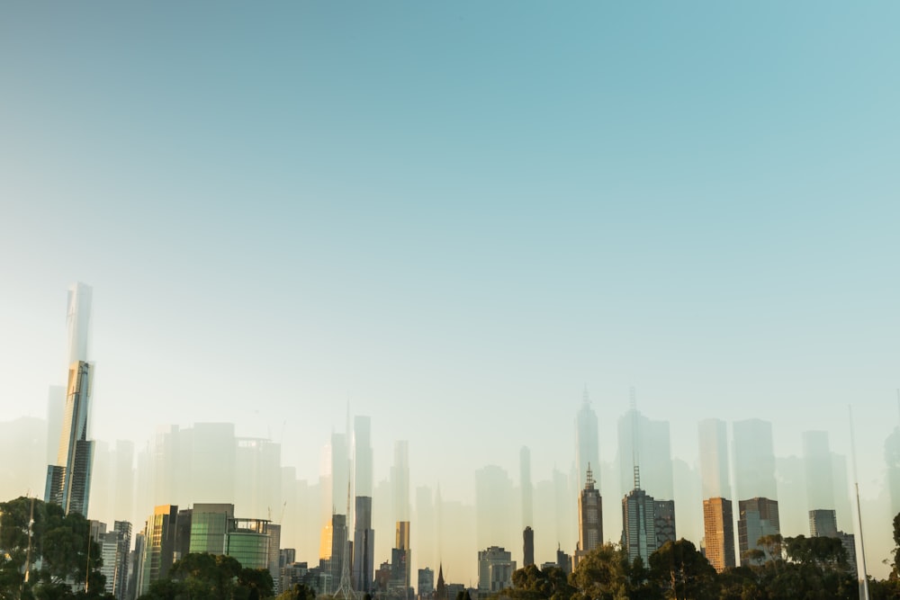 city skyline under blue sky during daytime