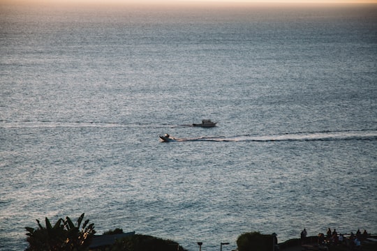 person riding on boat on sea during daytime in Laguna Beach United States