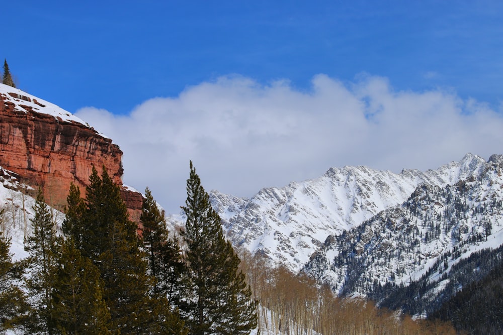 snow covered mountain under blue sky during daytime