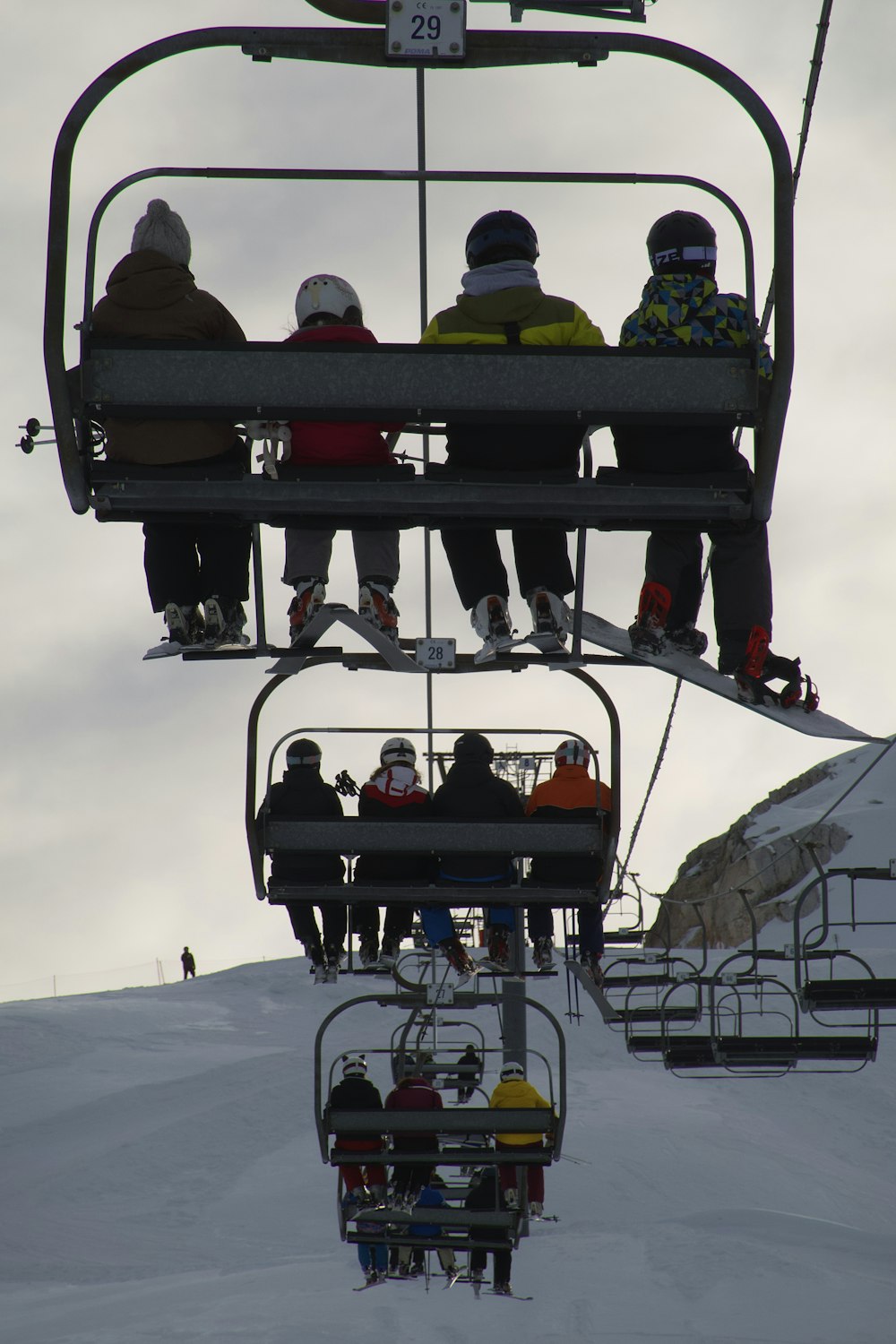 people riding on cable car during daytime