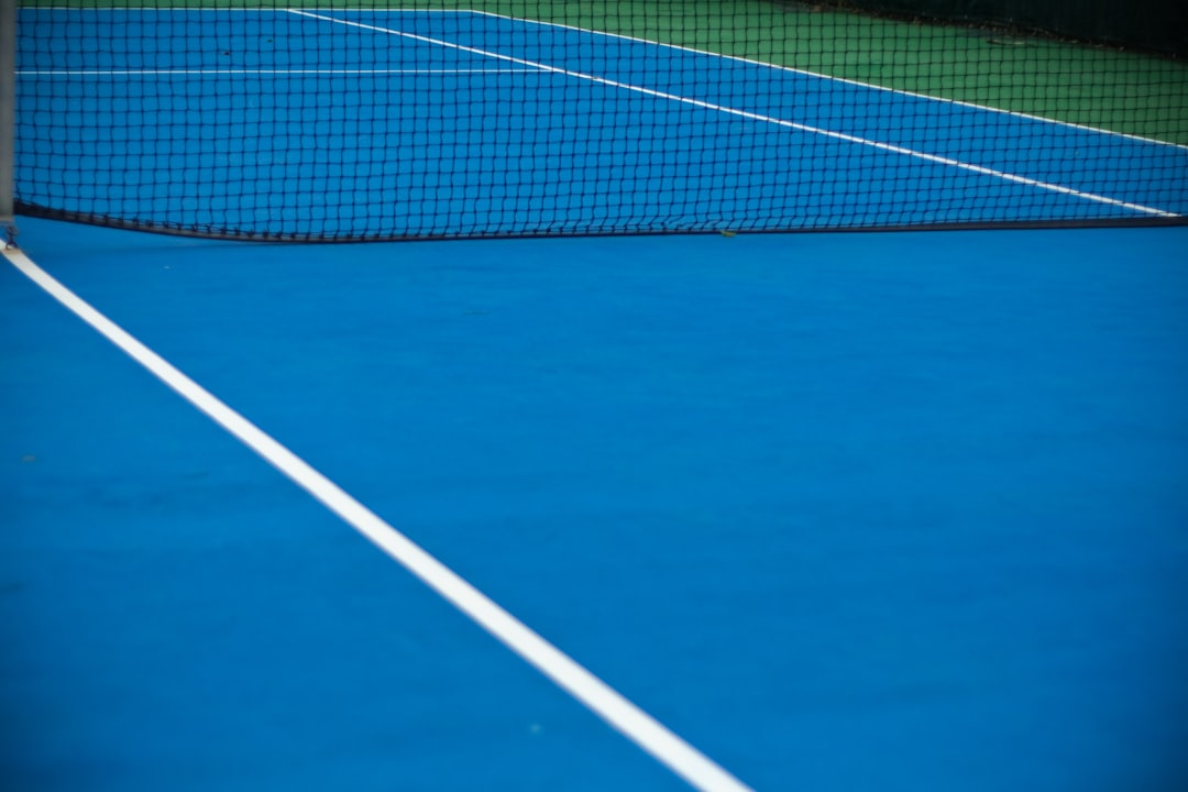 white and red tennis net,