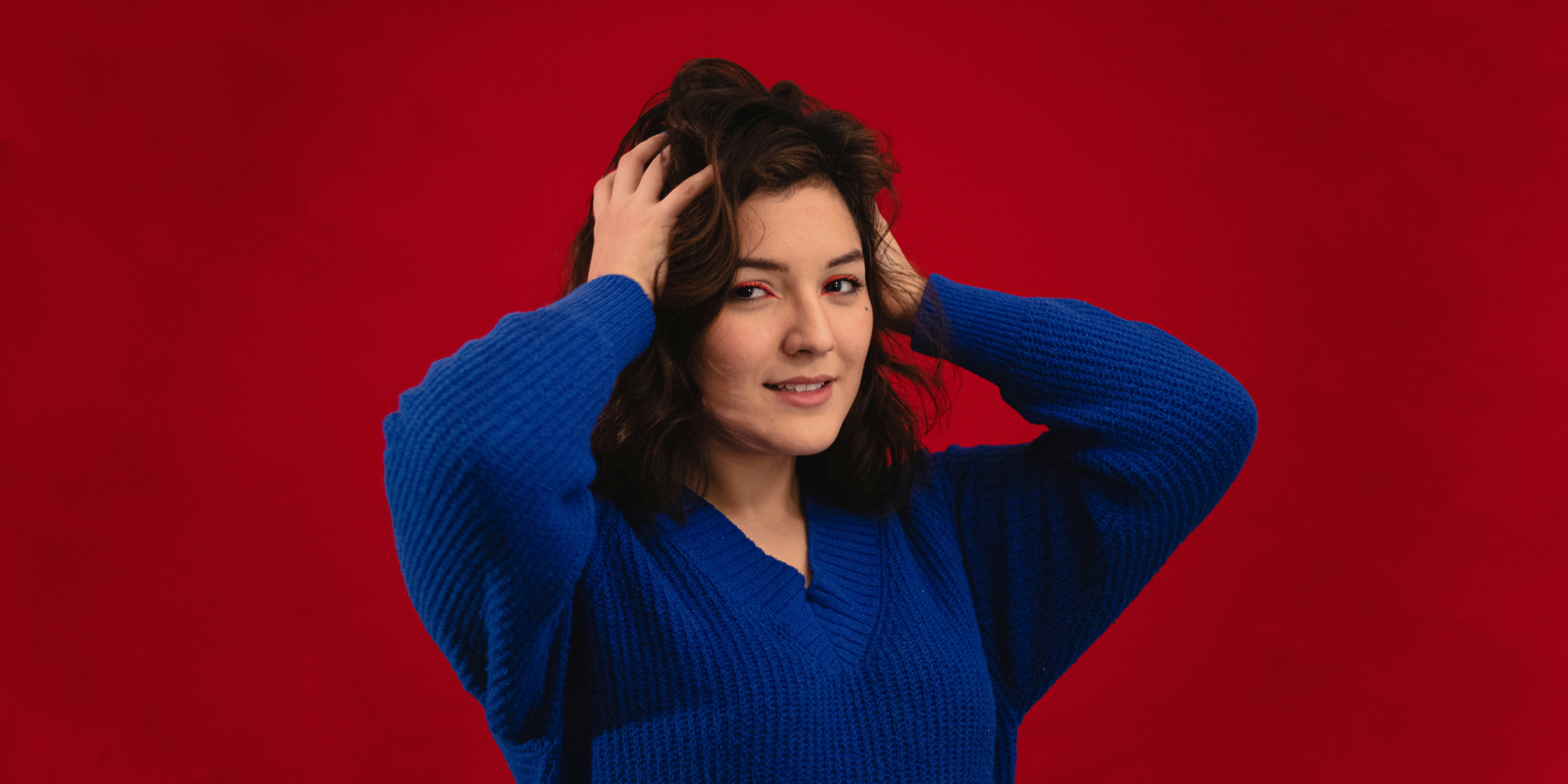 Red background girl, sexy, model woman. empowerment
