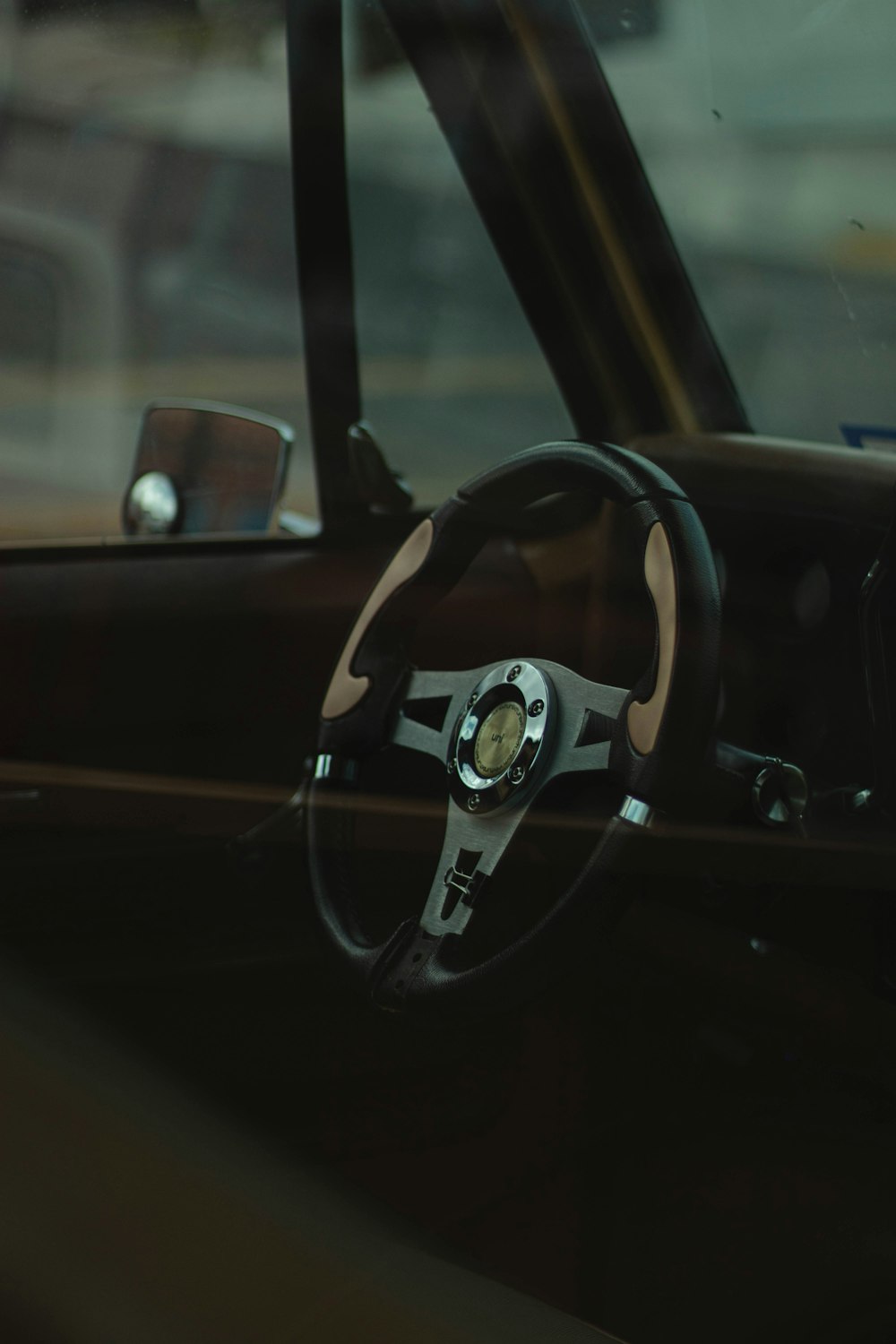 black and silver steering wheel