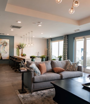 black wooden coffee table near white couch