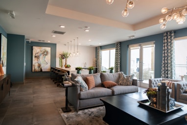 black wooden coffee table near white couch