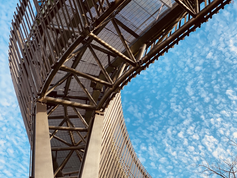 gray metal tower under blue sky during daytime