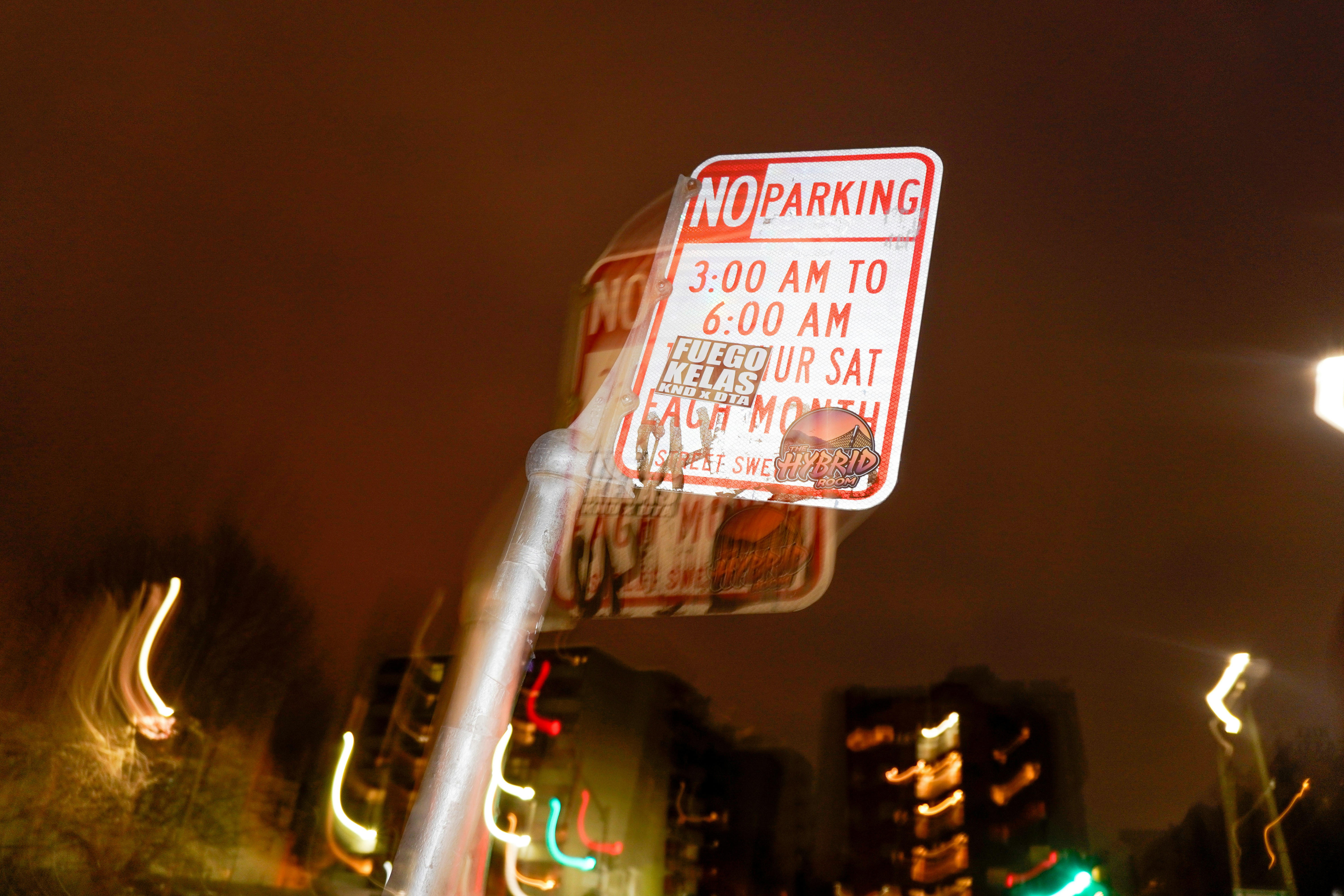 white and red street sign