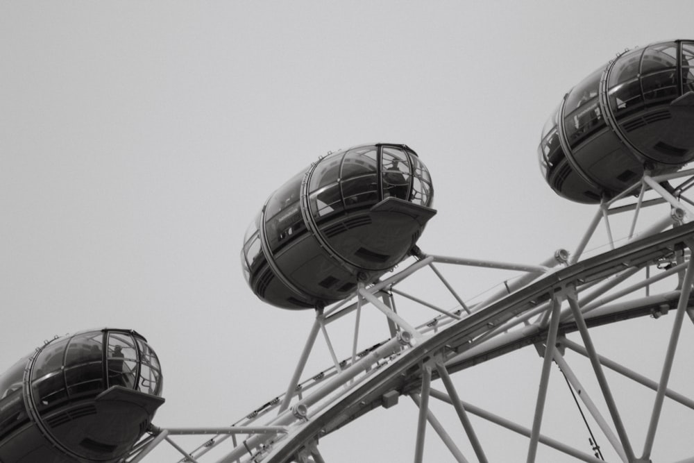 white and black ferris wheel under blue sky during daytime