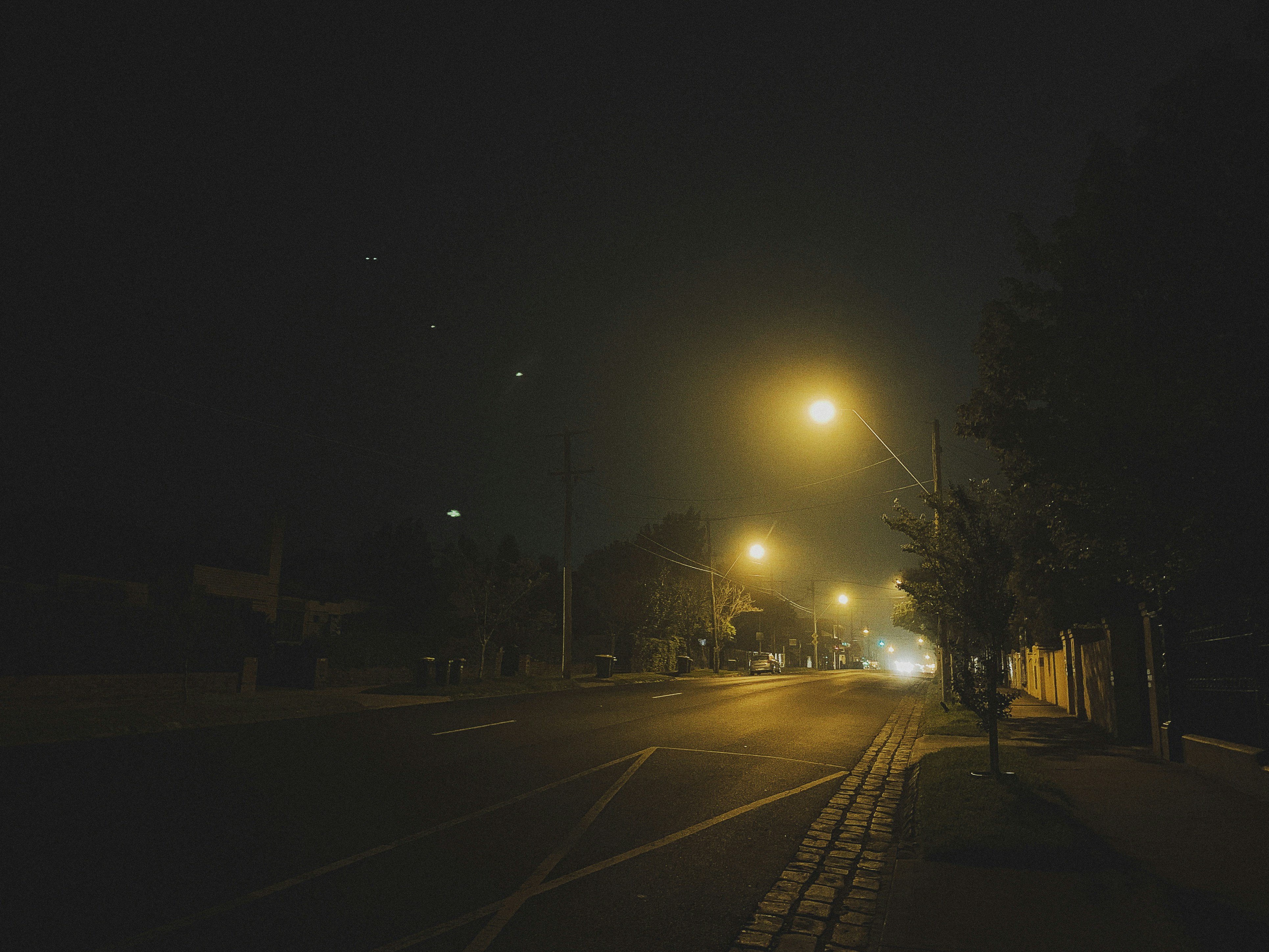 Street light turned on during night time photo Free Tarmac Image on