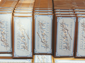 Rows of dark and milk chocolate bars stacked neatly on shelves